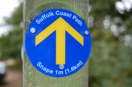 A close-up of a Suffolk Coast Path Waymark Disc